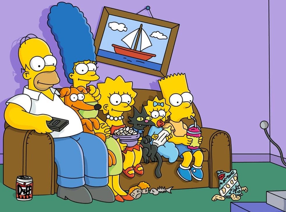Simpson cartoon characters watching television in the living room.